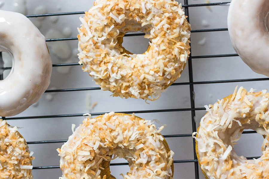 Thankfully, these baked vegan coconut pumpkin donuts allows a little sweet indulgence without the guilt.