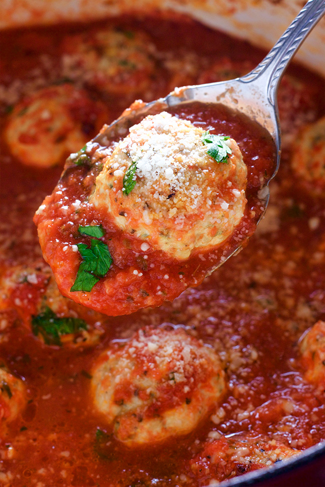 This Chicken Parmesan meatball bake recipe is super easy and simple. Perfect for any weeknight dinner. All the same flavors without the extra work. 