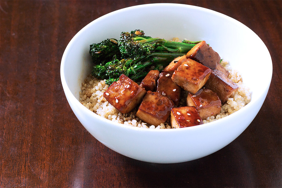 This ginger soy tofu bowl is a flavor packed way of making a quick, nutritious week night dinner in a pinch. Super healthy, super delicious. 