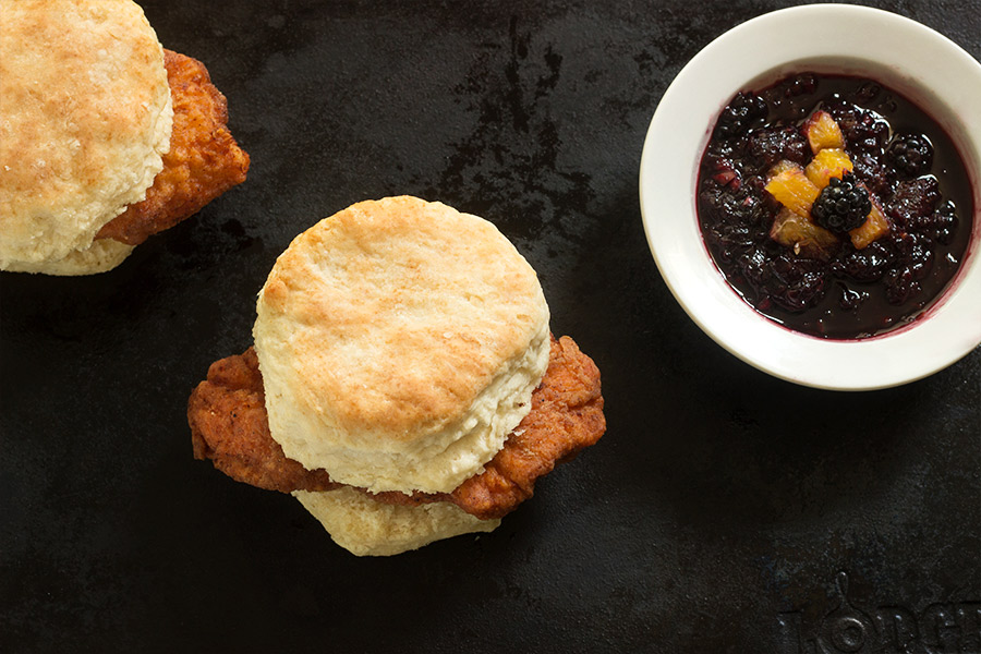 Over the top buttermilk chicken biscuit with blackberry habanero sauce is crispy, flaky a little sweet, spicy and a lot of delicious. 