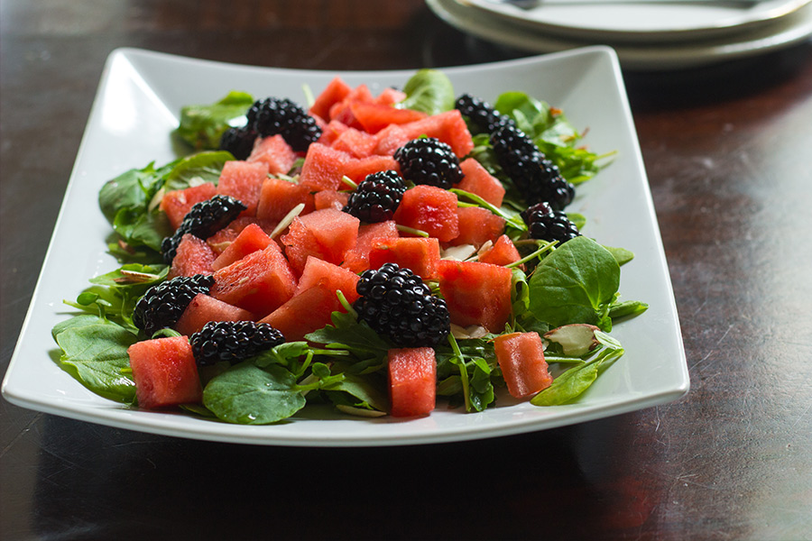 This blackberry watermelon salad is the perfect punctuation for the beginning of summer. The salad is tossed in a honey poppyseed dressing.