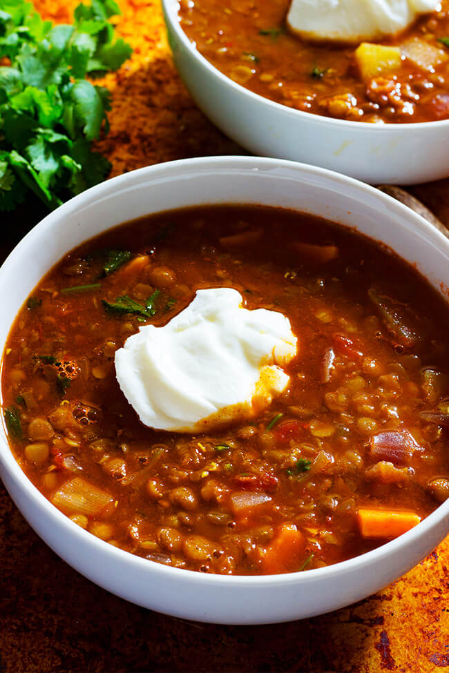 This Lentil and Chicken Stew recipe is perfect for when you just want something hearty, warming & comforting to eat. Slow cooker recipe with tons of flavor. 