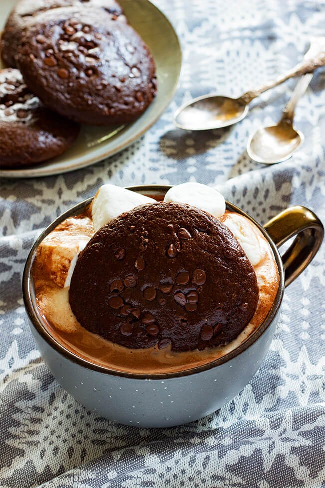This hot chocolate is my idea of comfort food. It is warming, creamy and perfectly decadent. Loaded with marshmallows and topped with a muffintop is all I need in life. 
